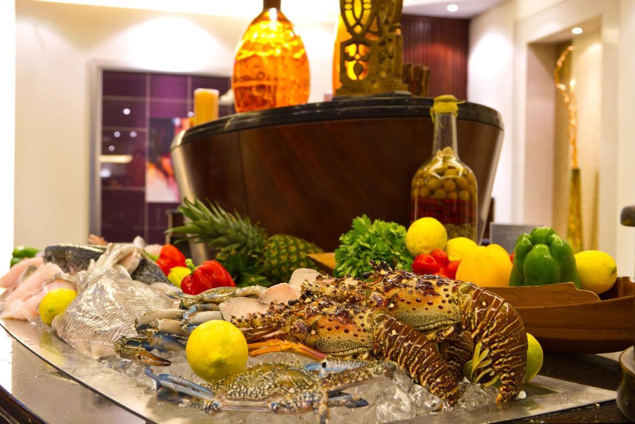 Radisson Blu Resort, Sharjah Exterior photo A seafood buffet